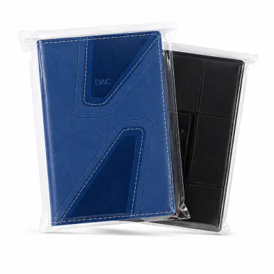 Caderno multifuncional da marca DC, disponível nas cores azul e preta, ideal para estudantes e uso no escritório