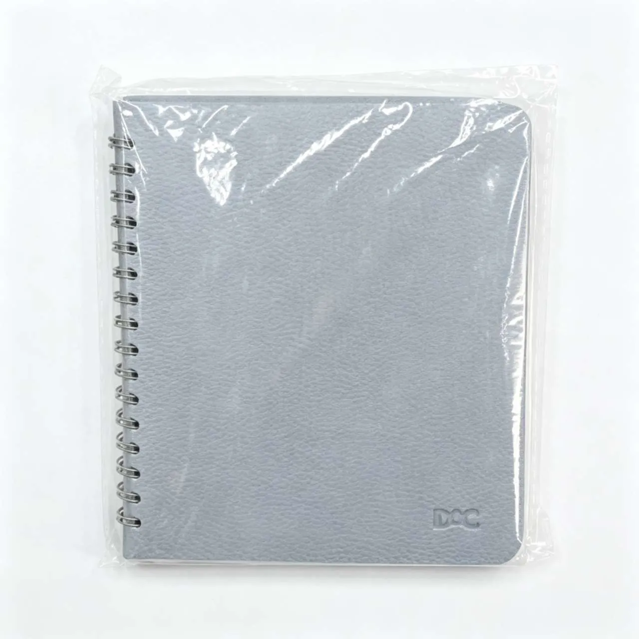 Caderno portátil cinza, marca DMC, ideal para estudantes e uso em escritório