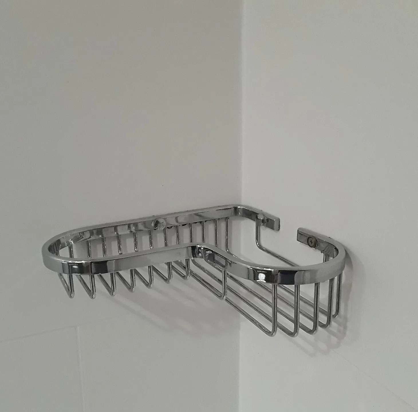 Esquinero para ducha de acero cromado