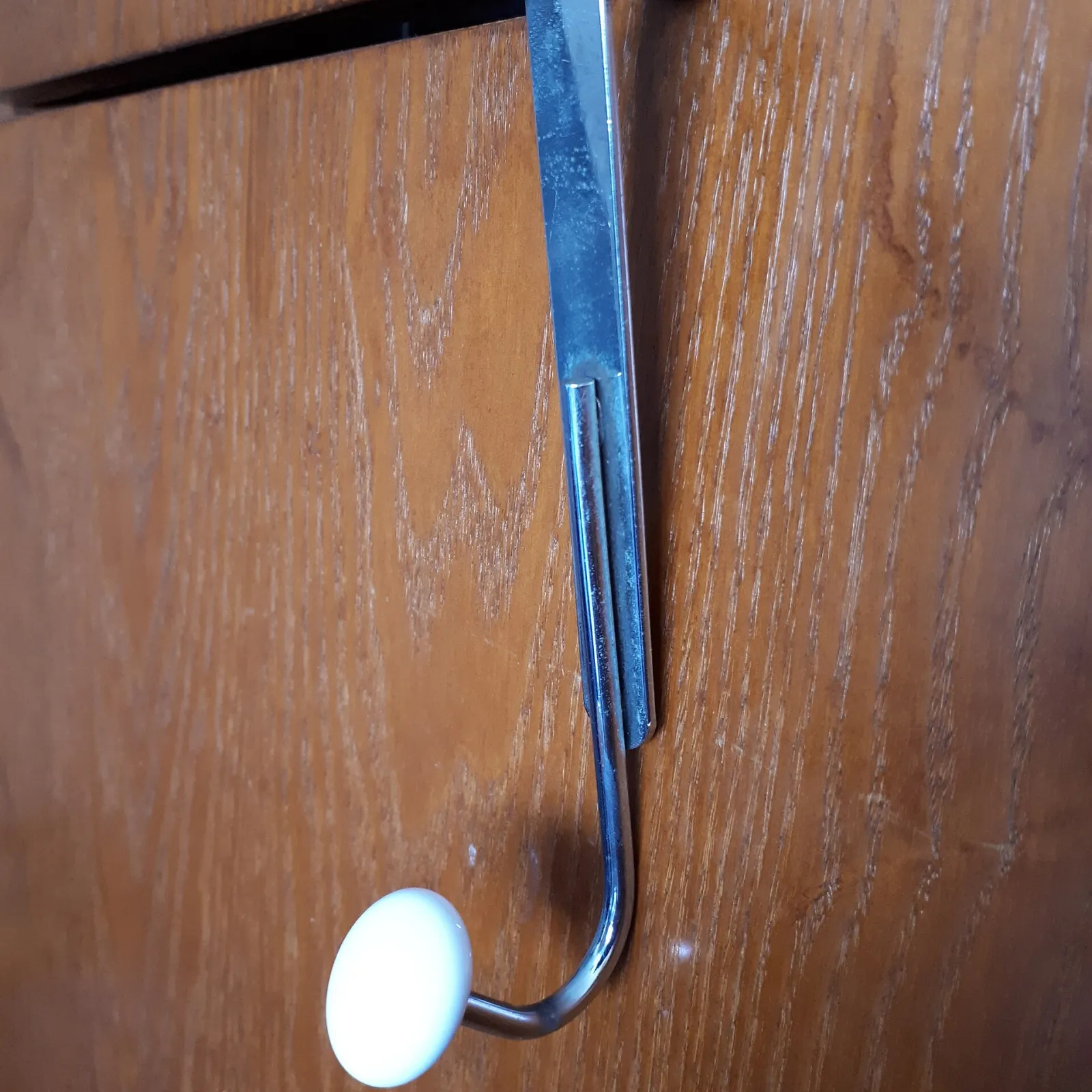 Gancho de porta em aço com ponteira de cerâmica